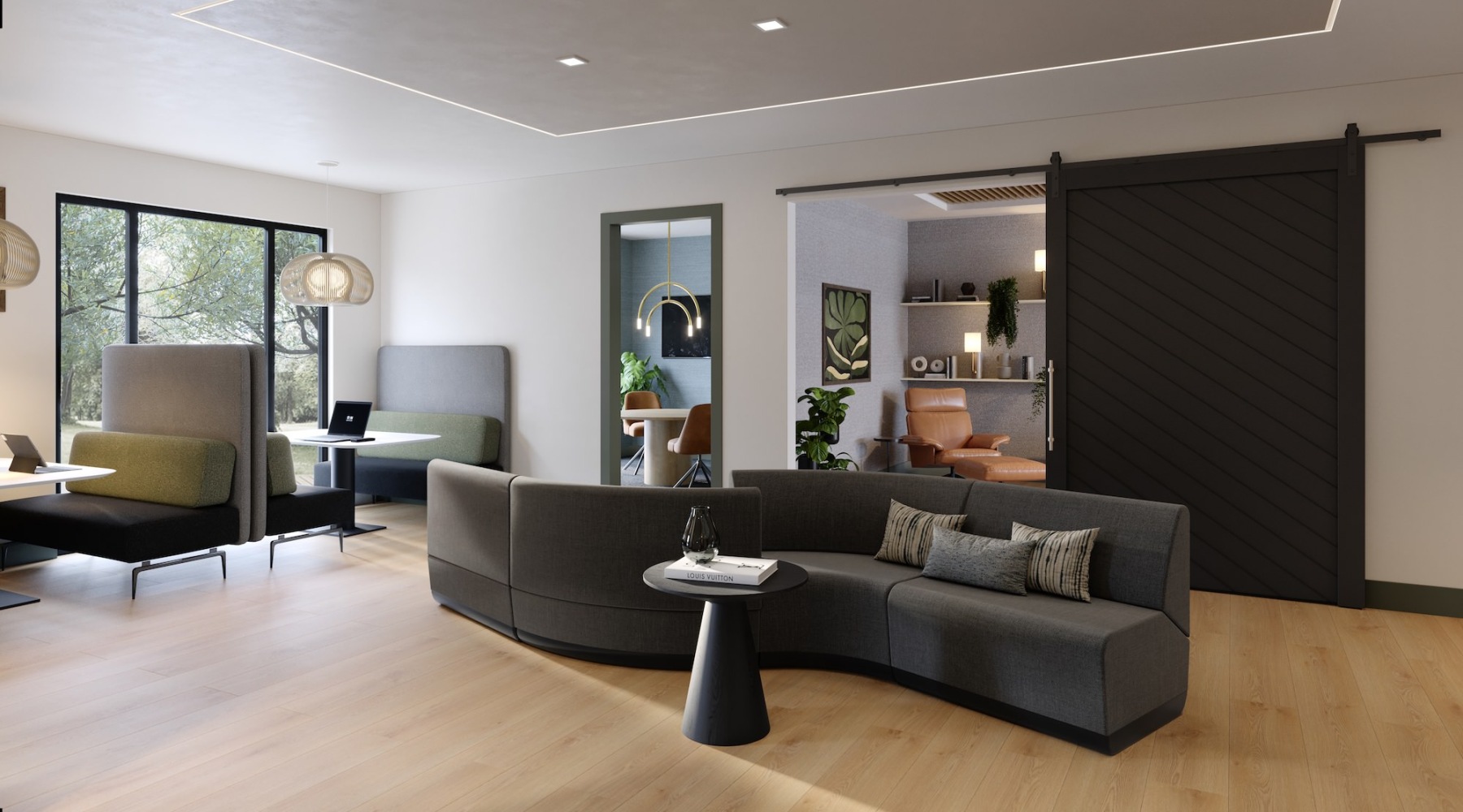 a lounge with natural light and a sofa