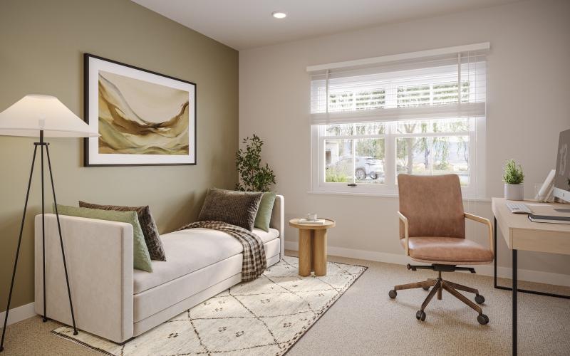 a living room with a couch and a chair